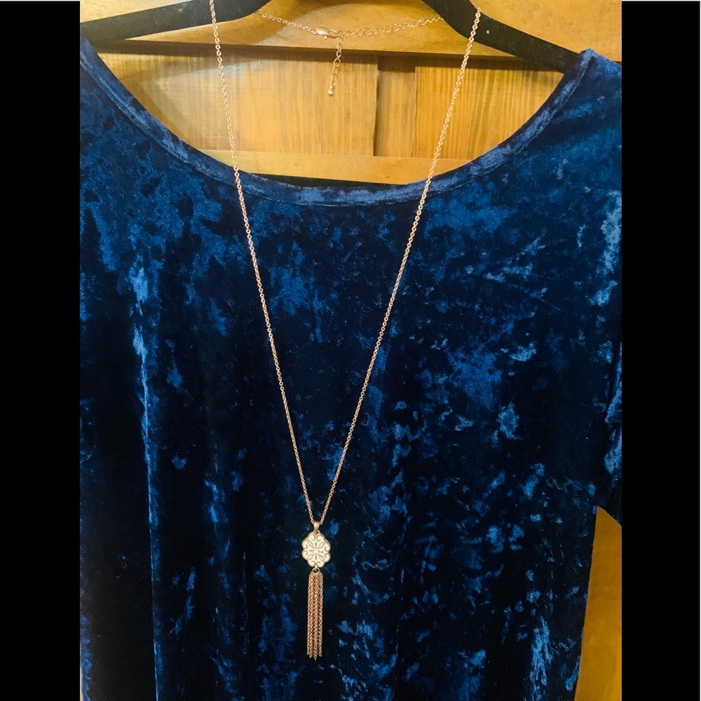 Women’s necklace - Gold chain with white bead and tassels.